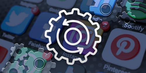 image of outlined gear with circular arrows inside over a background of social media icons